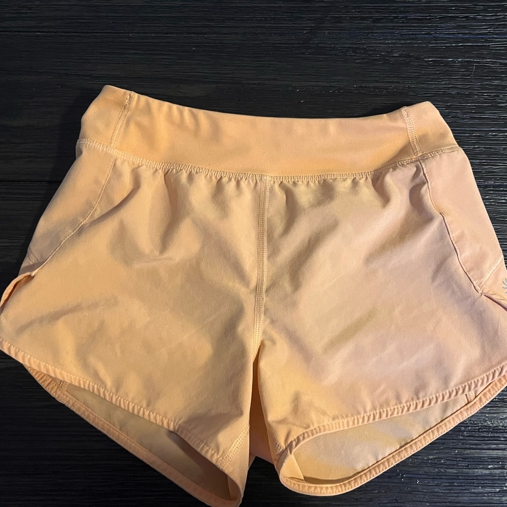 Coral Athleta shorts, good for activity’s